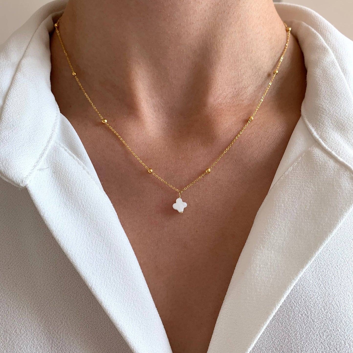 Necklace with white clover pendant
