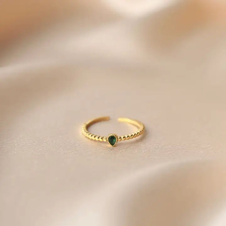 Ring with teardrop stone