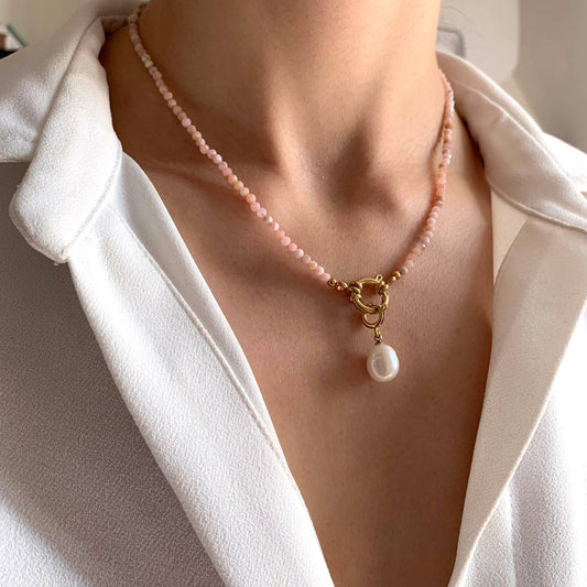 Necklace made of pink natural stone with pearl