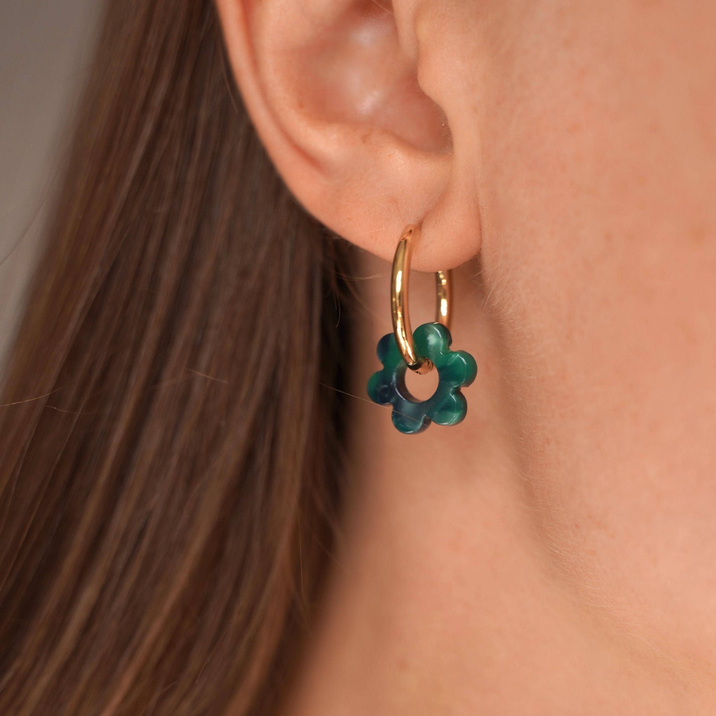 Hoop earrings with blue flower