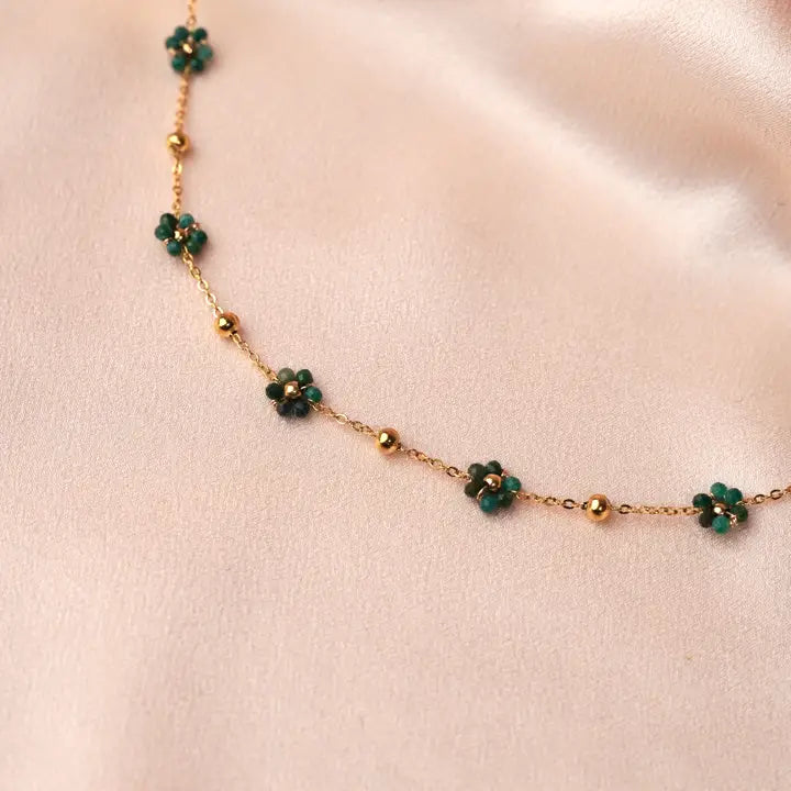 Necklace with green pearl flowers
