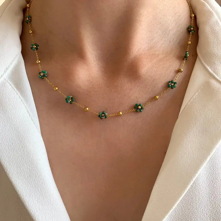 Necklace with green pearl flowers