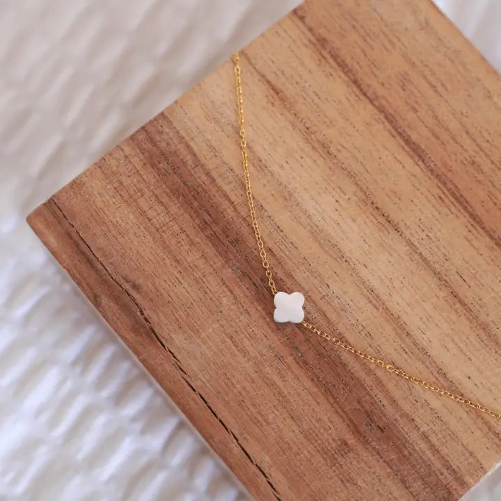 necklace with white clover leaf