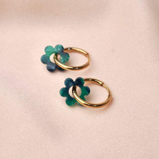 Hoop earrings with blue flower