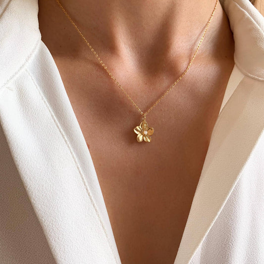 Chaîne en acier inoxydable sobre avec pendentif fleur