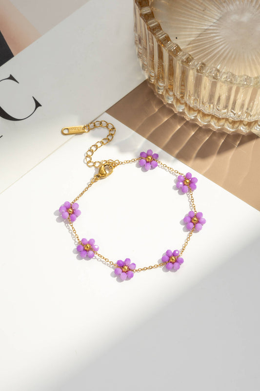 Armband mit lila Perlenblumen