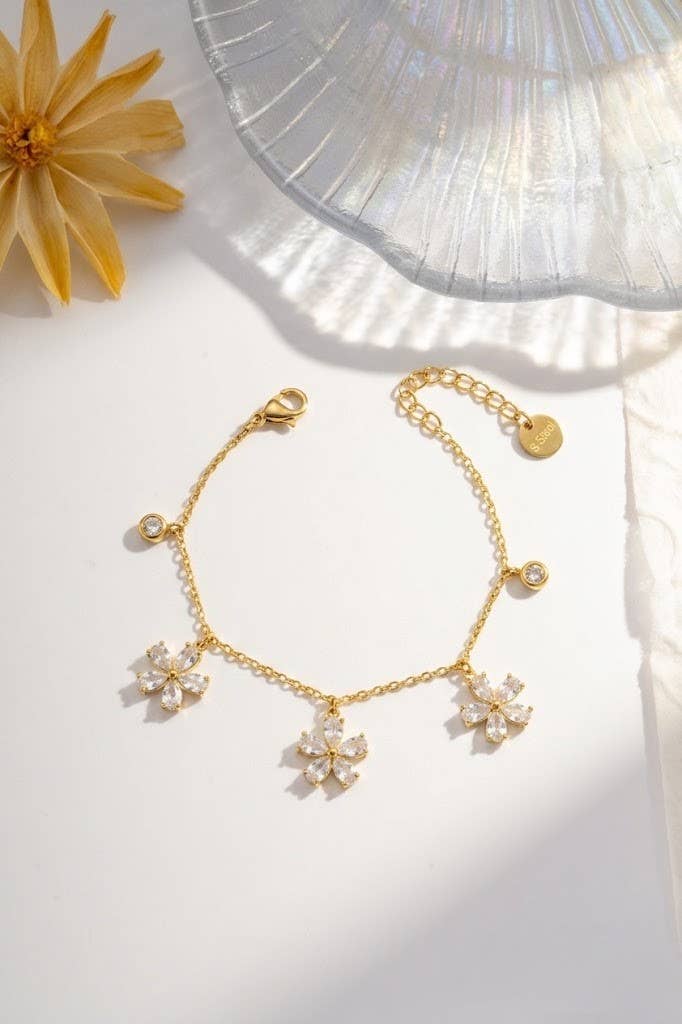 Goldenes Armband mit großen Kristall Blumen