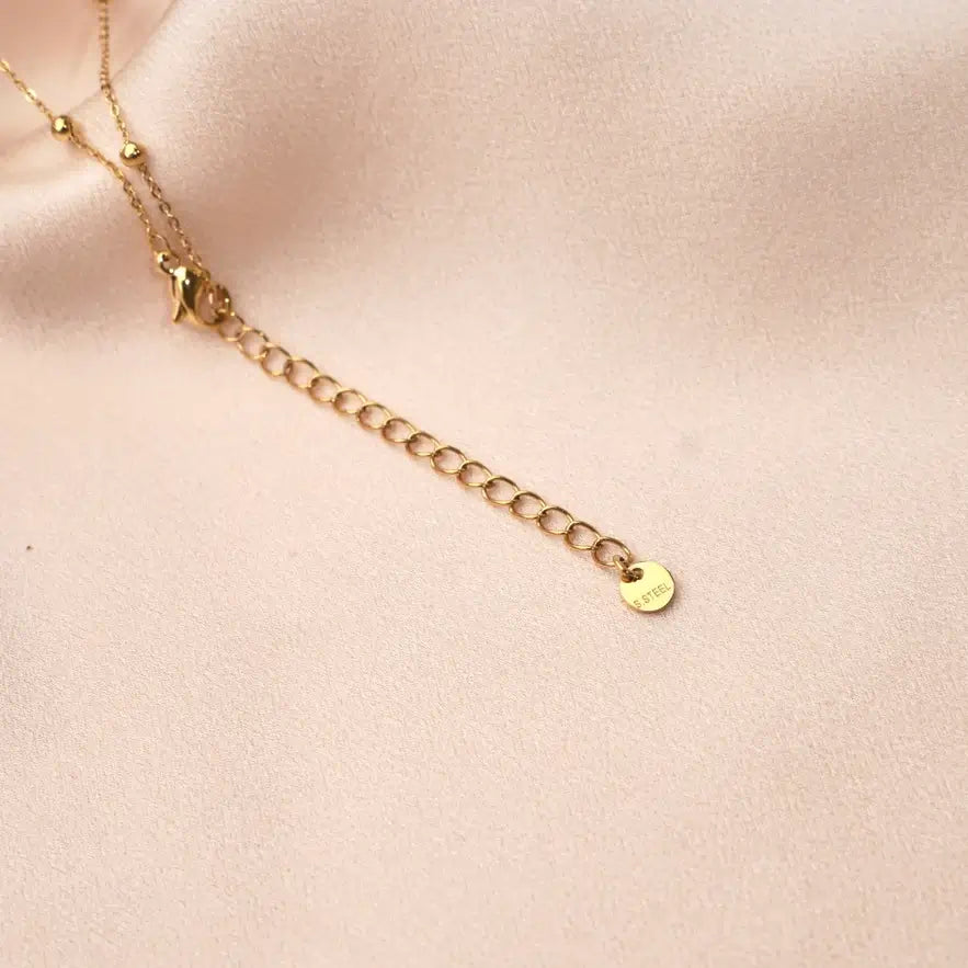 necklace with red pendant
