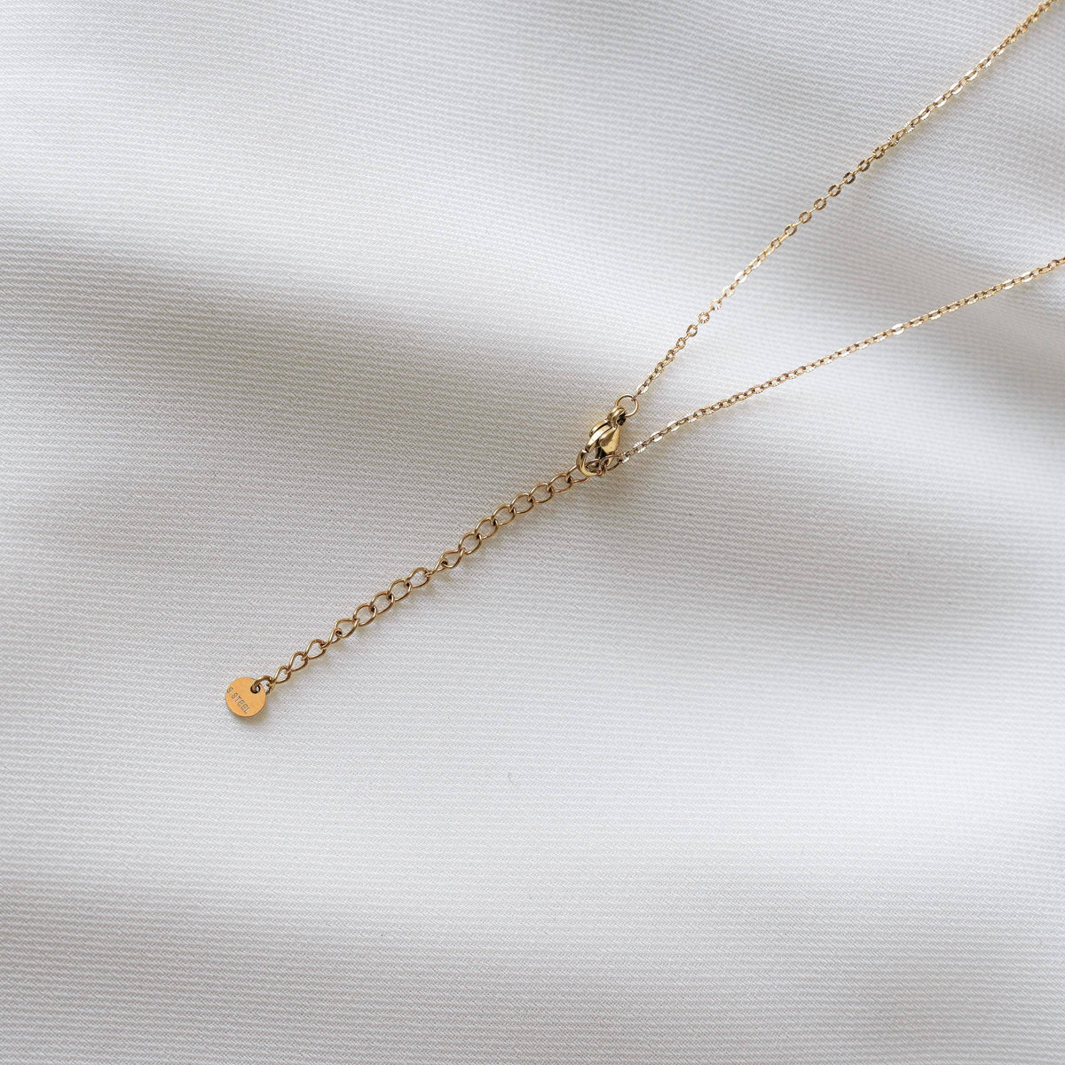 Chaîne en acier inoxydable sobre avec pendentif fleur