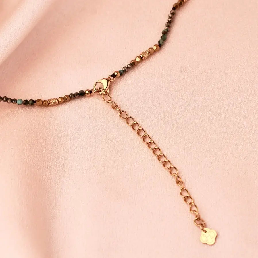 Necklace with stones and drop pendant