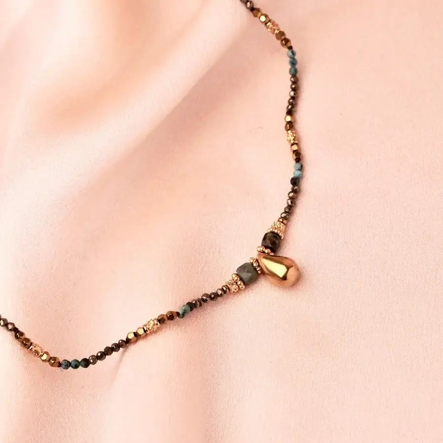 Necklace with stones and drop pendant